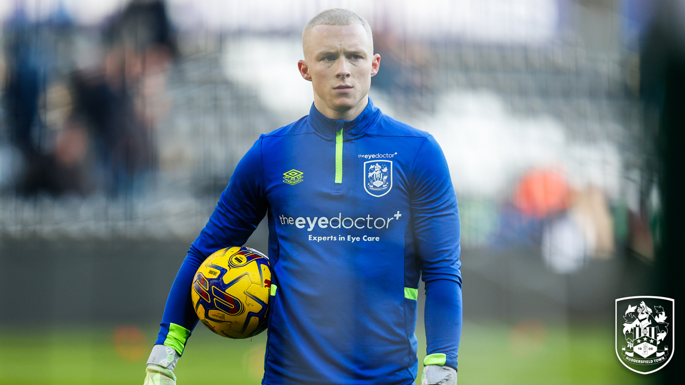 Huddersfield Town goalkeeper Jacob Chapman signs a two-year contract extension with the club